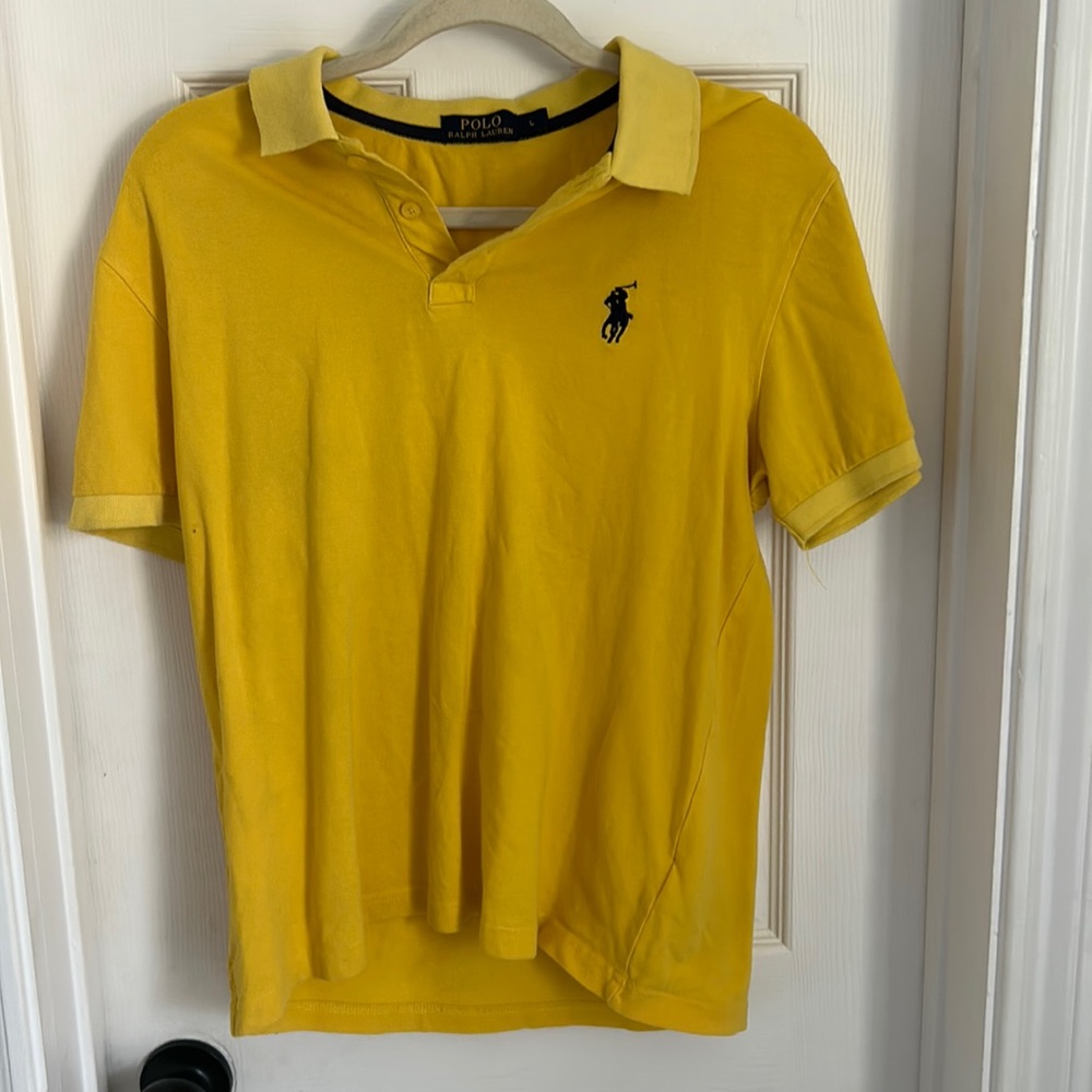 Yellow polo shirt good condition no marks or tears